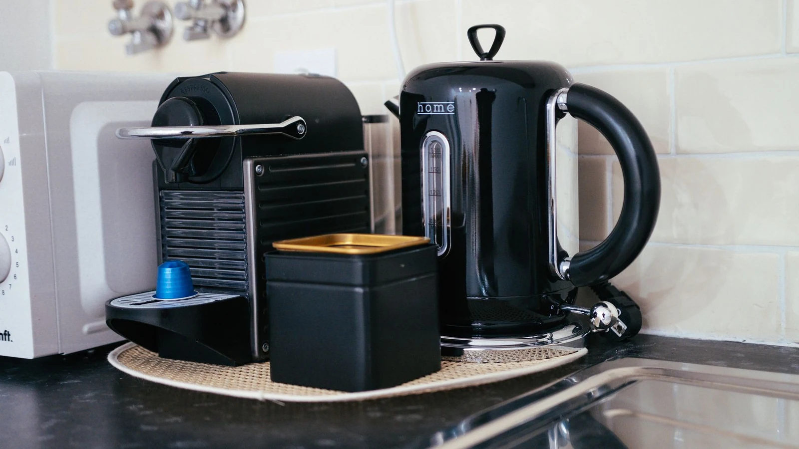 Small kitchen appliances sitting on a home countertop